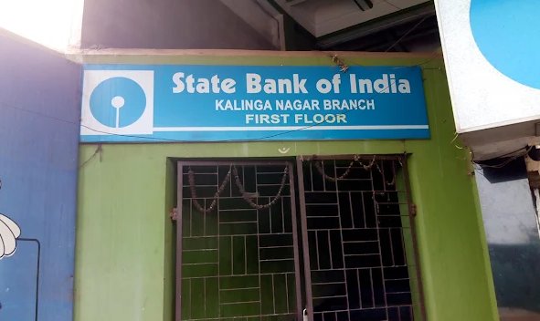 SBI Kalinga Nagar Branch signboard on green building wall