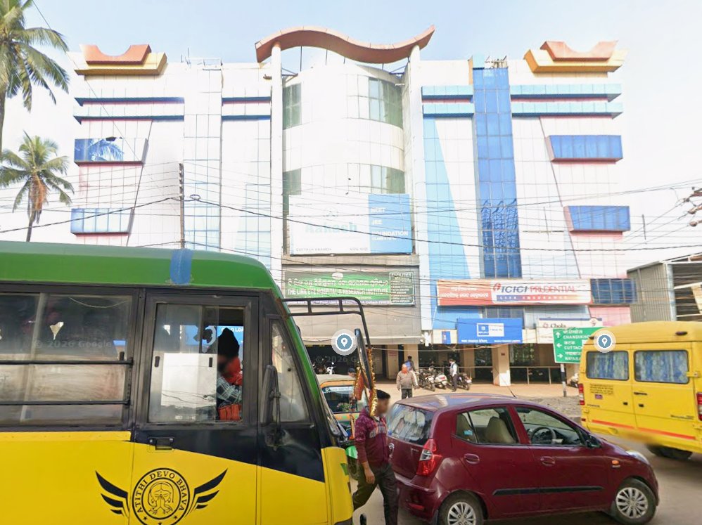 Bajaj Finance Cuttack branch building near Naya Chowk with ICICI Prudential